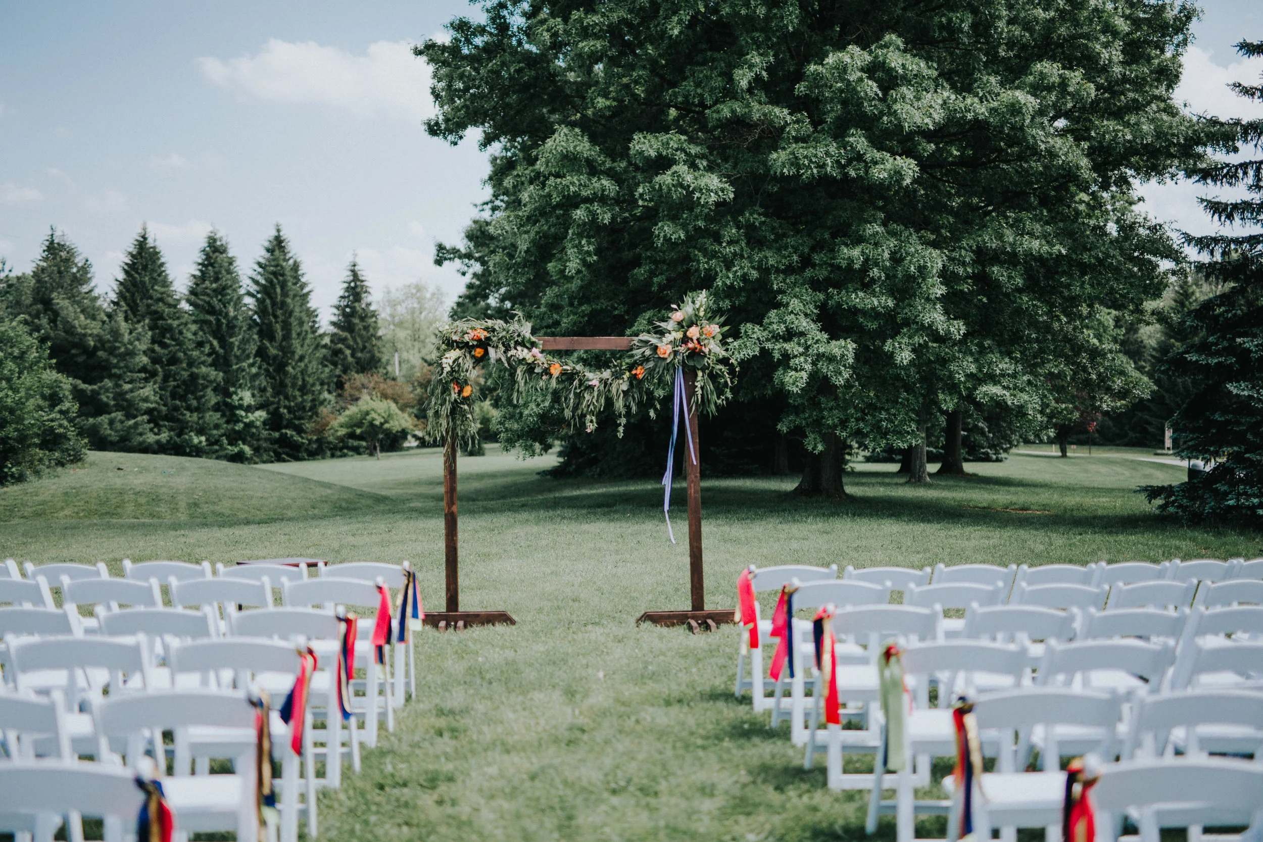 Heritage Barn wedding ceremony on the lawn