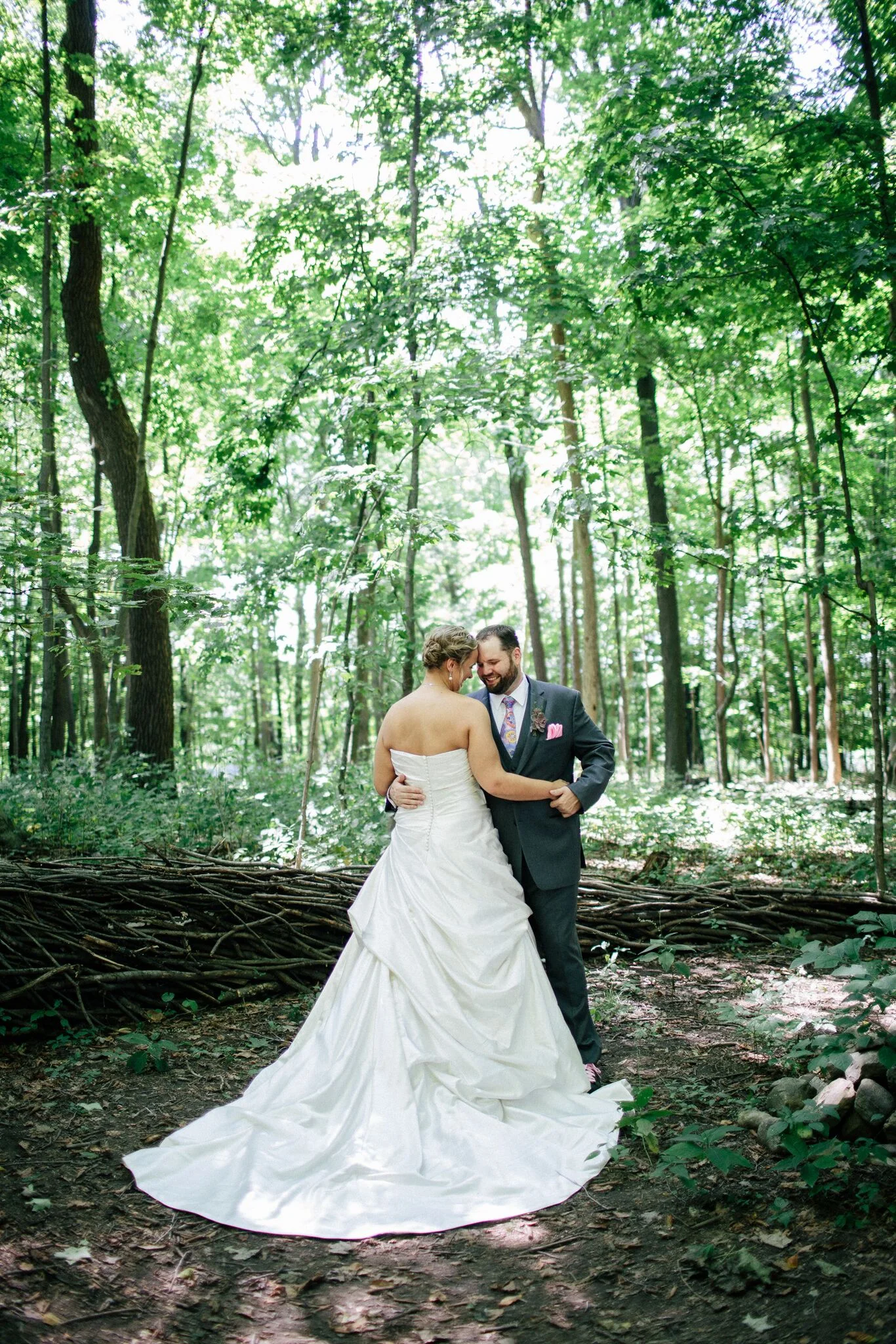  bride and groom in the forest at The Inn At Honey Run wedding 